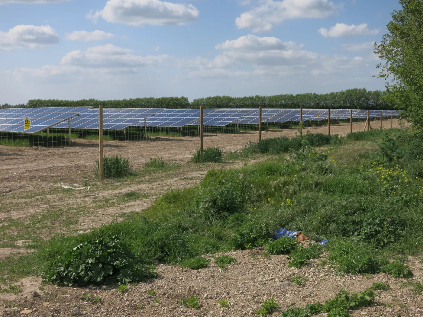 Solar panels at Muncey's Farm, near Flint Cross. The data centre would be built beside this solar farm, down the byway past Norbury's. The photograph pre-dates the plans.